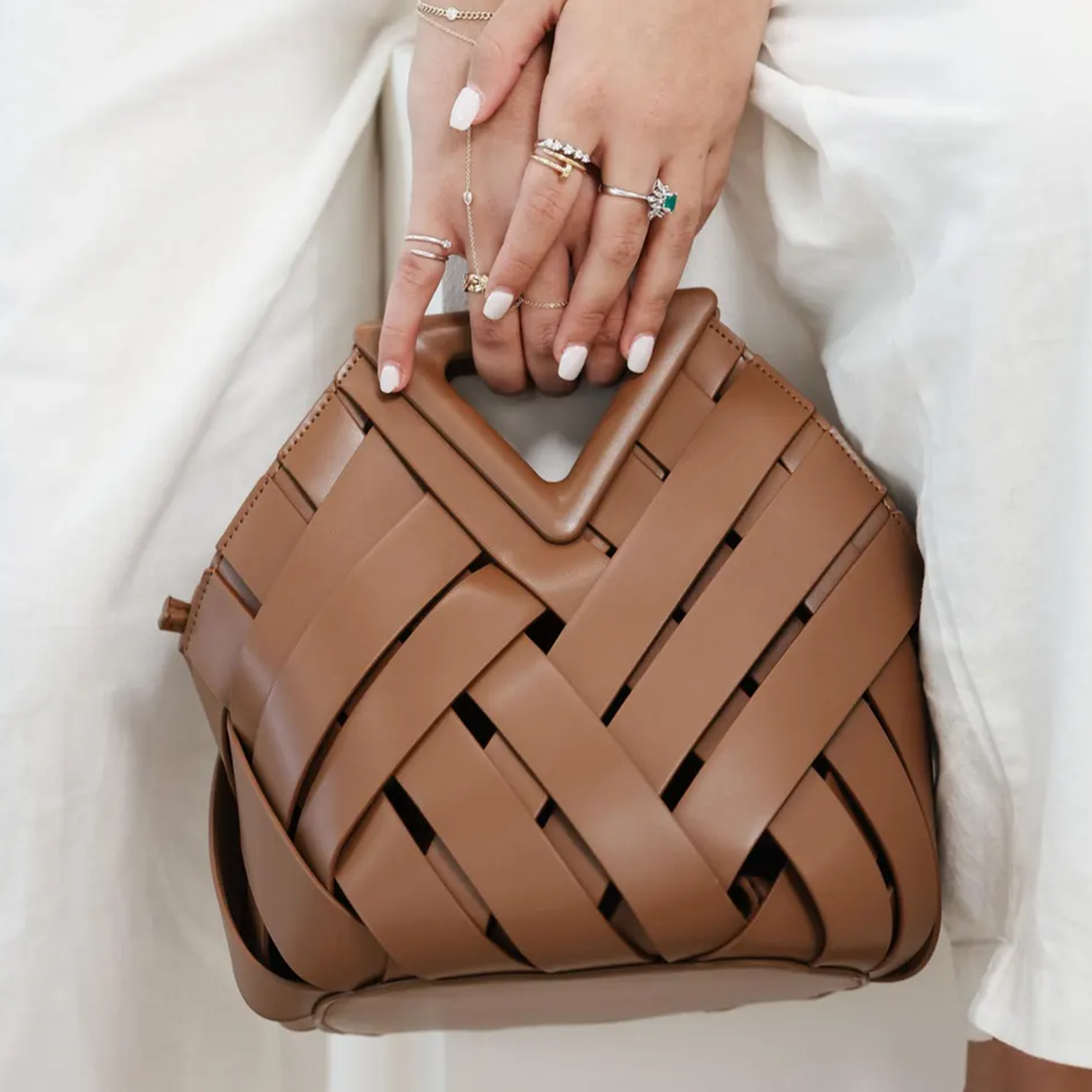Multi-Tone Wide-Strip Woven Geometric Handbag With Angular V-Cut Top Grip, Structured Contoured Frame And Convertible Carry Function