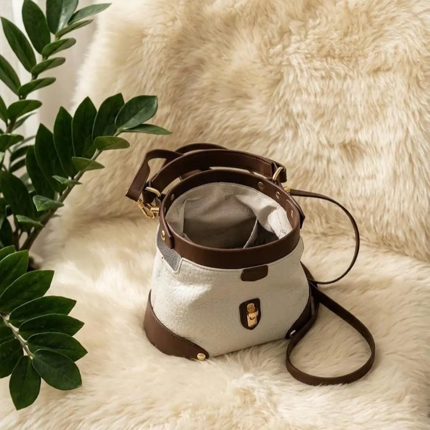 Multi-Tone Pebble Textured Dome Handbag With Contrast Brown Trim, Golden Turn-Lock Hardware And Dual Carry Fixtures